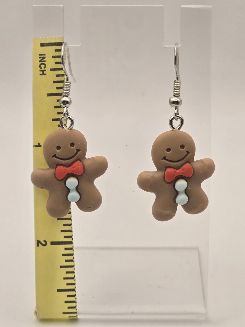 Gingerbread Man Drop Earrings in Brown with Red Bow